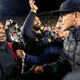 Mel Tucker (left) and Jim Harbaugh